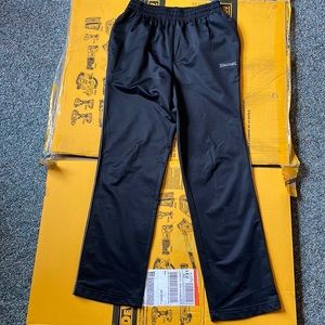 Black Spalding brand men’s jogger pants with thin gray stripe down the side